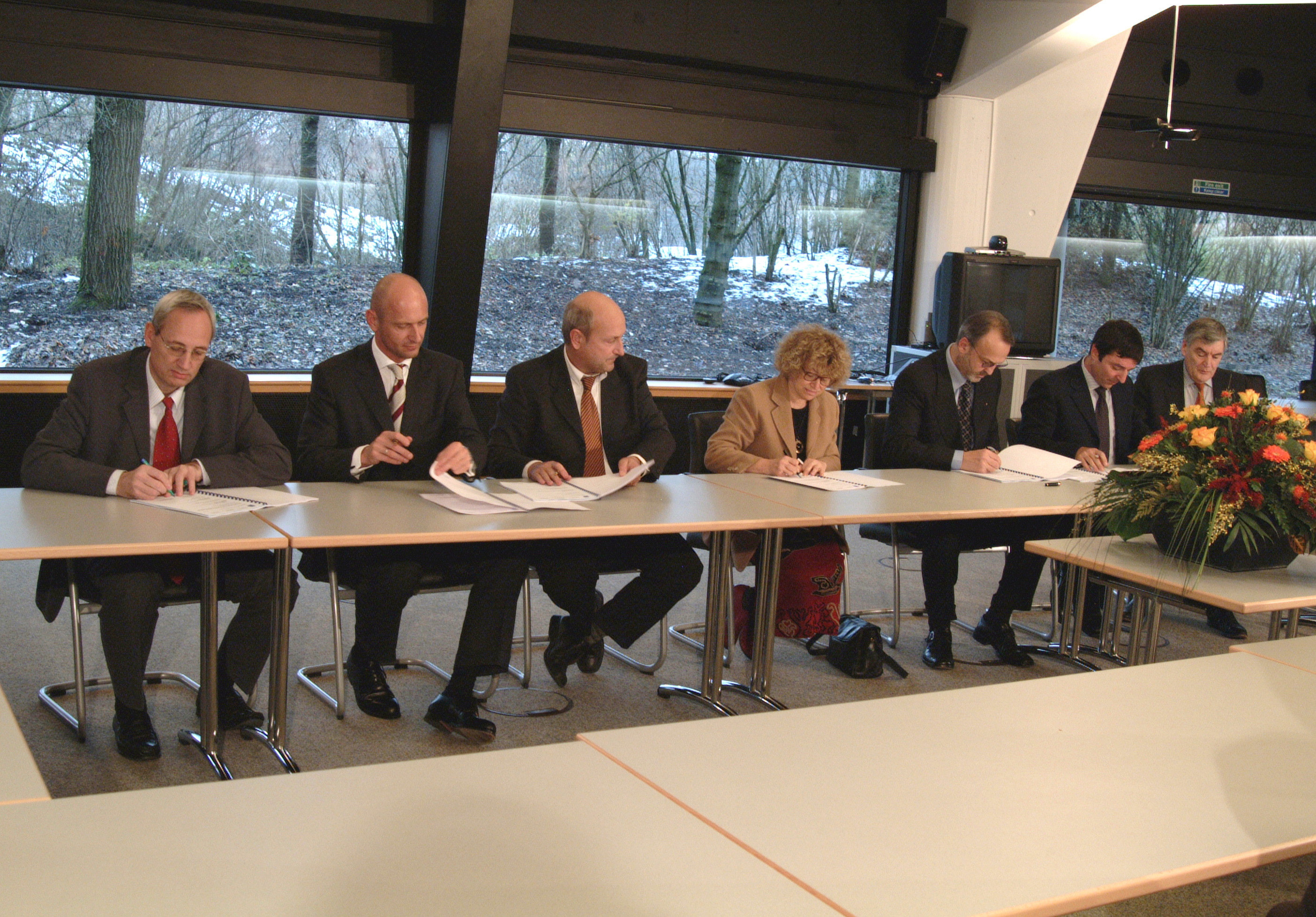 A signed financial contract on a desk